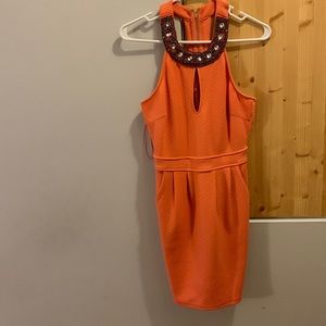 Coral Dress never been wore. Necklace like beads around neck with zipper pockets